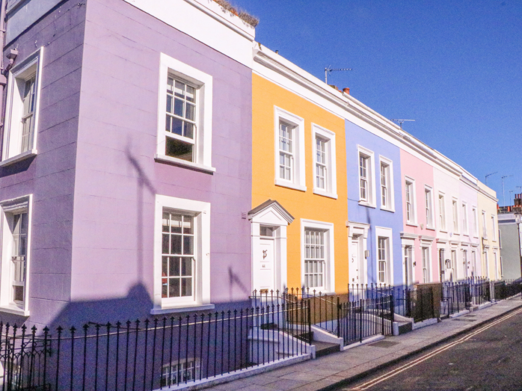 brightly coloured houses in notting hill gate