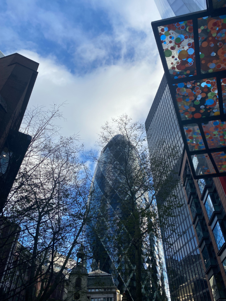 the gherkin against a blue london sky