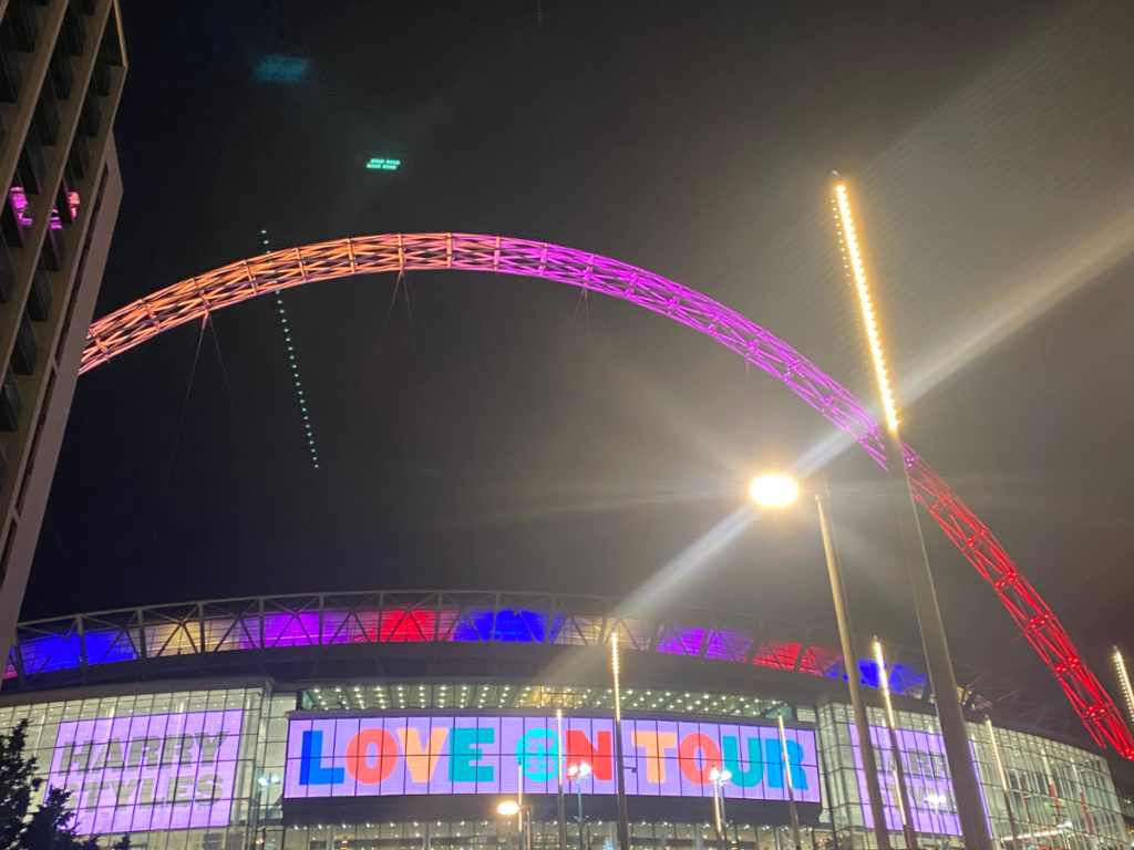 Wembley's arch lit up in technicolour