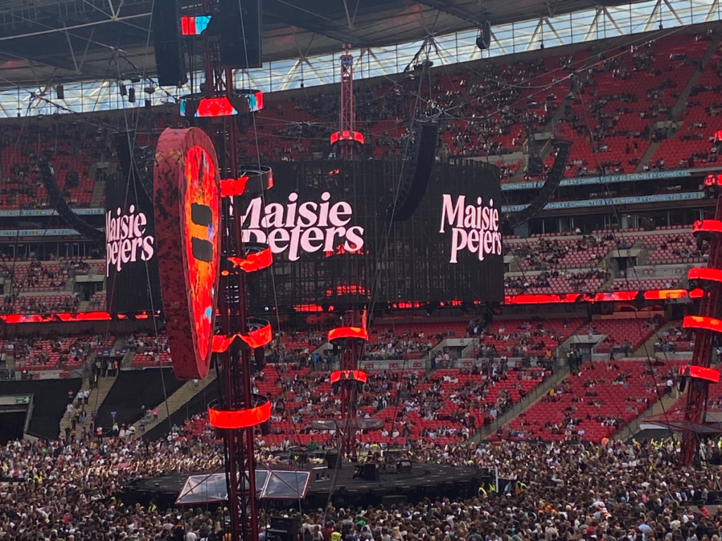 Maisie Peters performing at Wembley Stadium