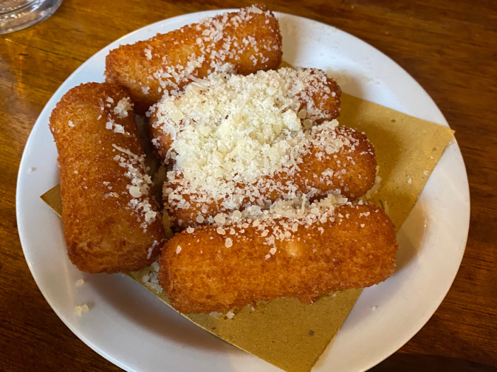 truffle potato croquettes topped with parmesan 